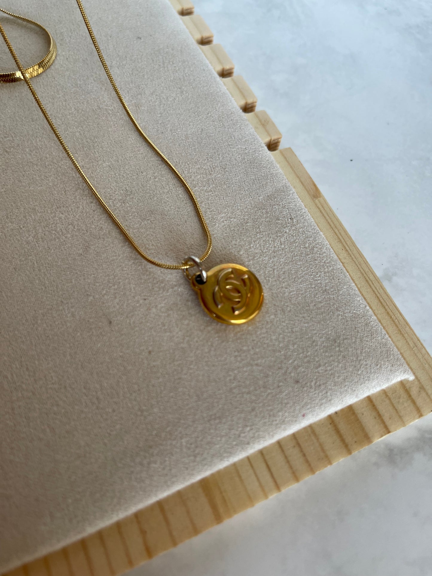 Upcycled authentic Chanel charm pendant