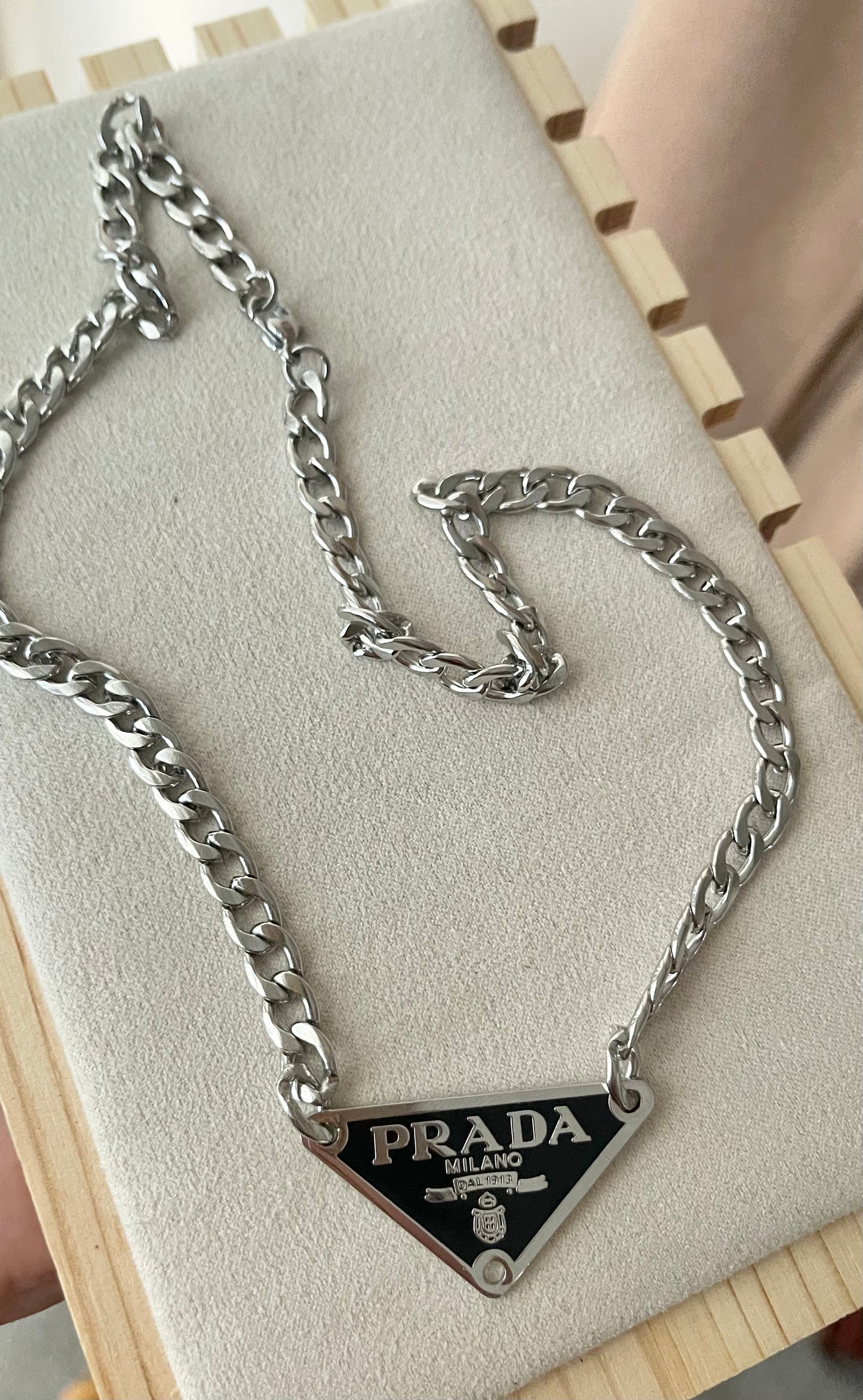 Upcycled Prada charm necklace
