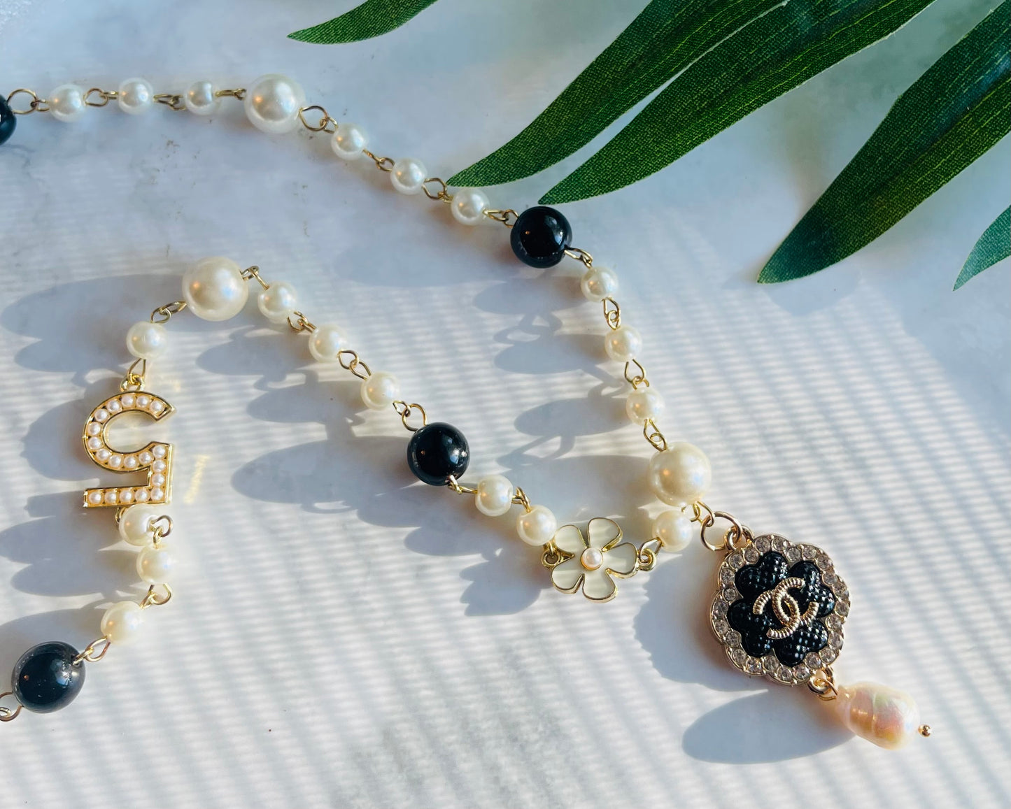 Upcycled charm necklace black and pearl