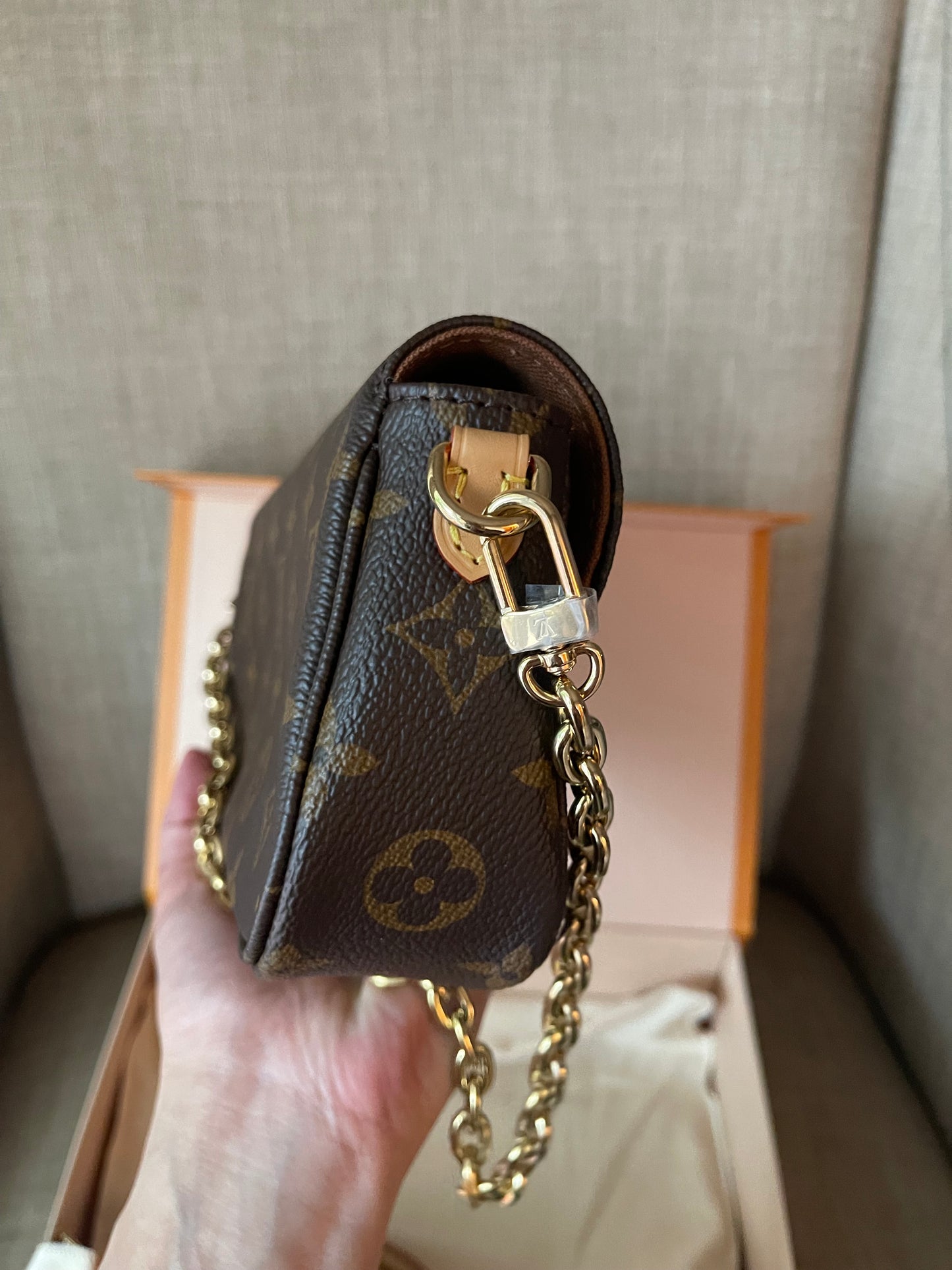 Authentic Louis Vuitton monogram wallet on chain ivy