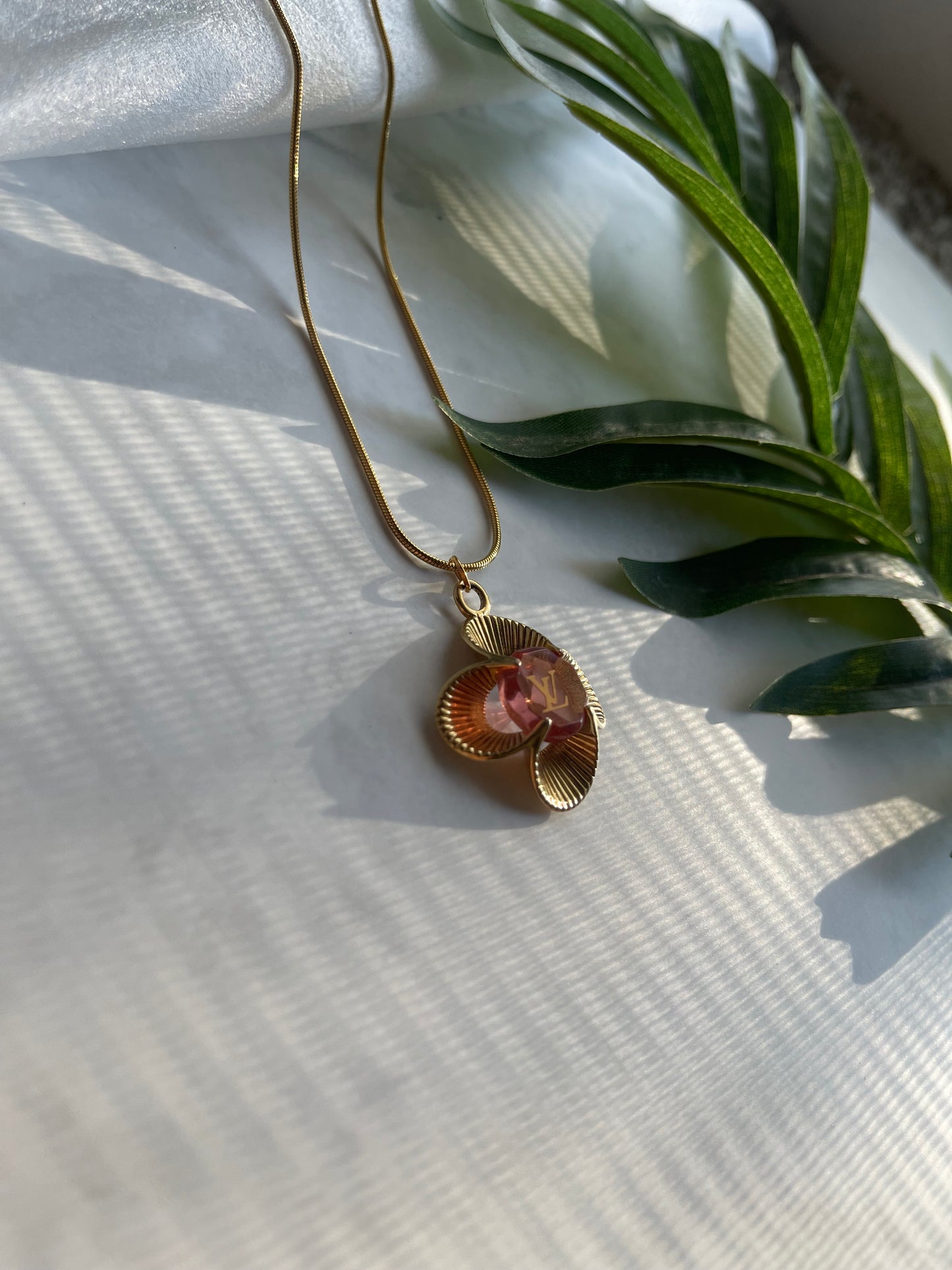 Upcycled LV flower cha necklace