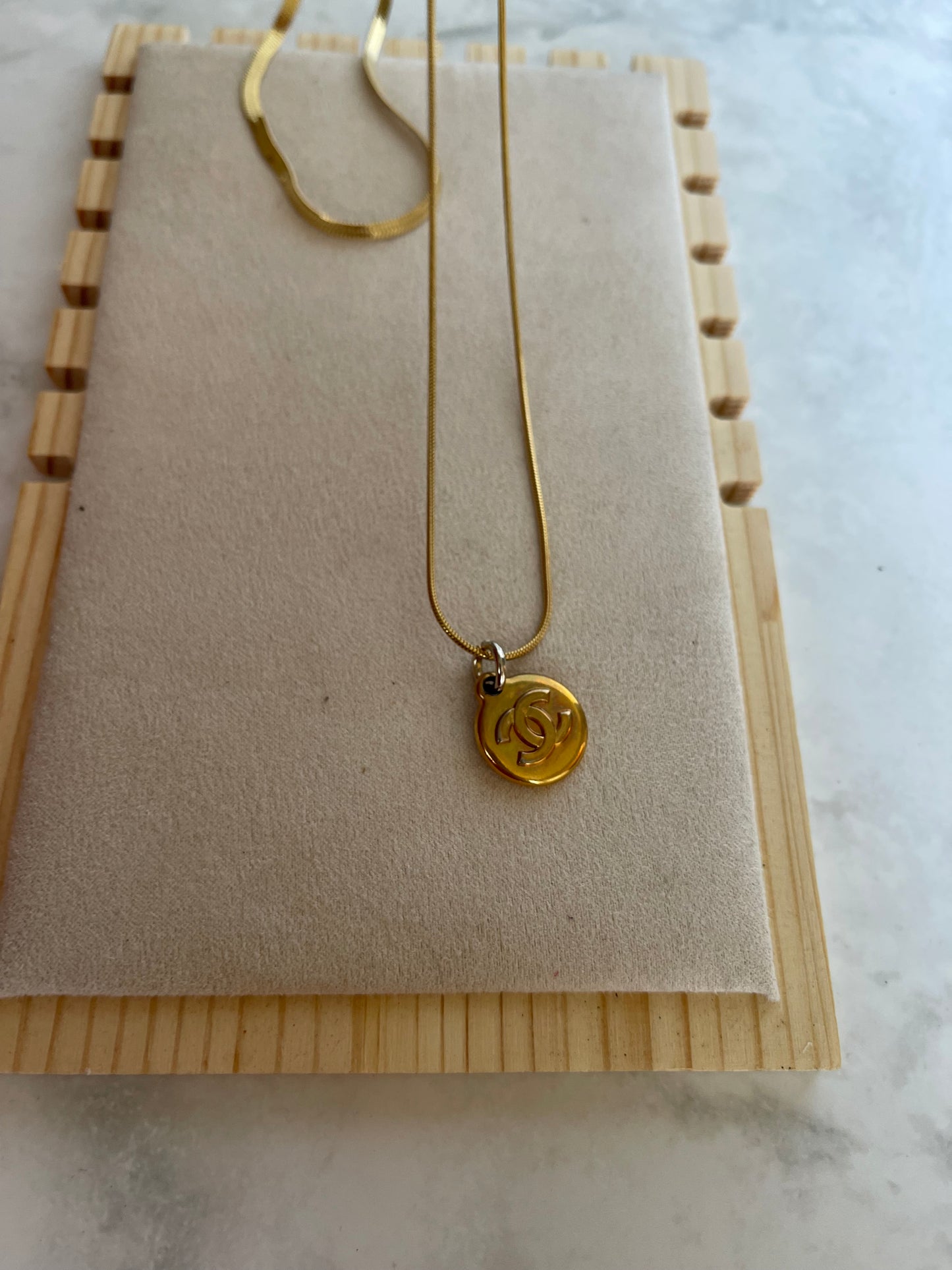 Upcycled authentic Chanel charm pendant