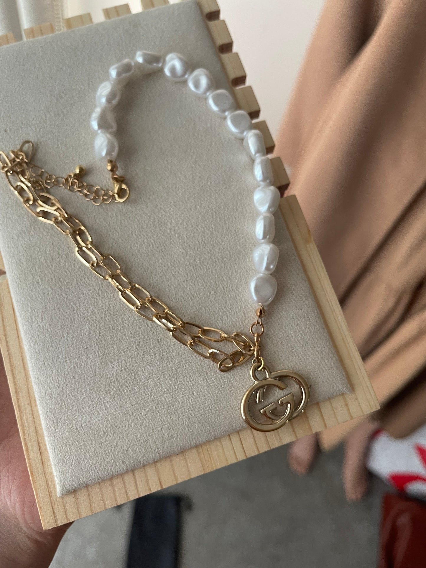 Upcycled charm necklace in gold and white