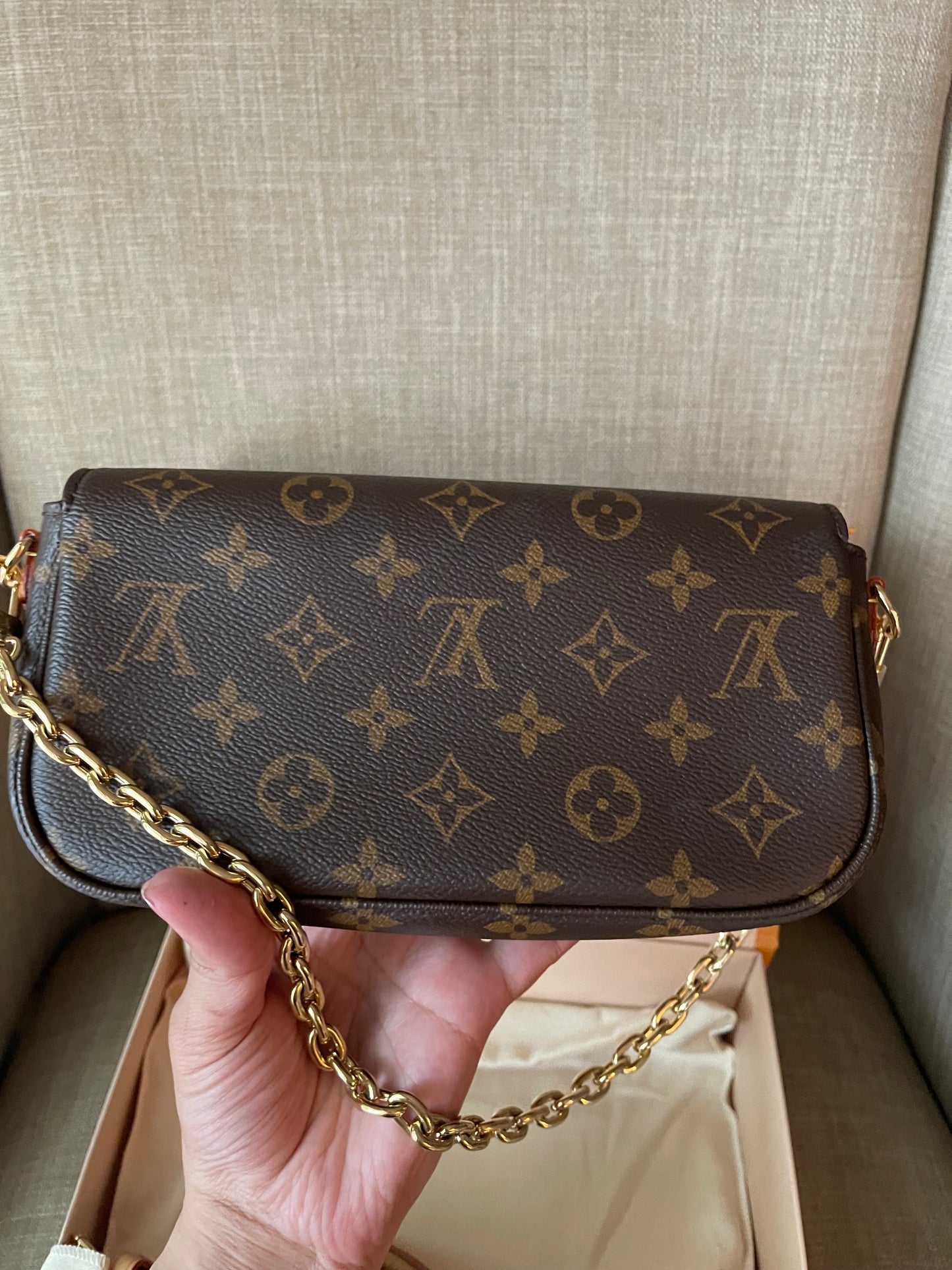 Authentic Louis Vuitton monogram wallet on chain ivy