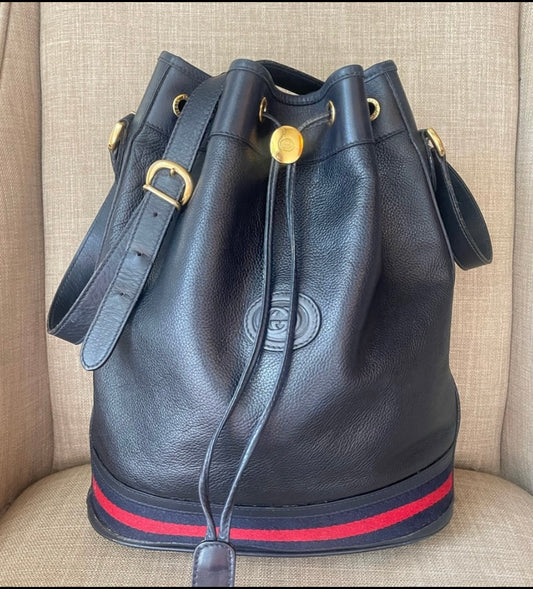 Authentic Gucci drawstring blue leather bag